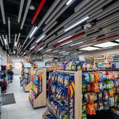Convenience store, aisle with snacks.