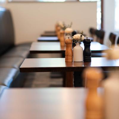 Tables with salt and pepper shakers..