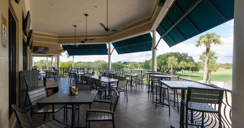 Exterior, tables and chairs on covered patio