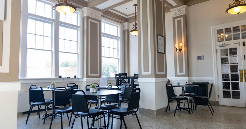 Interior seating area with chairs and tables