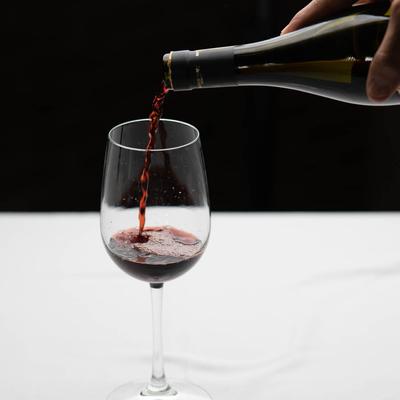 Pouring red wine