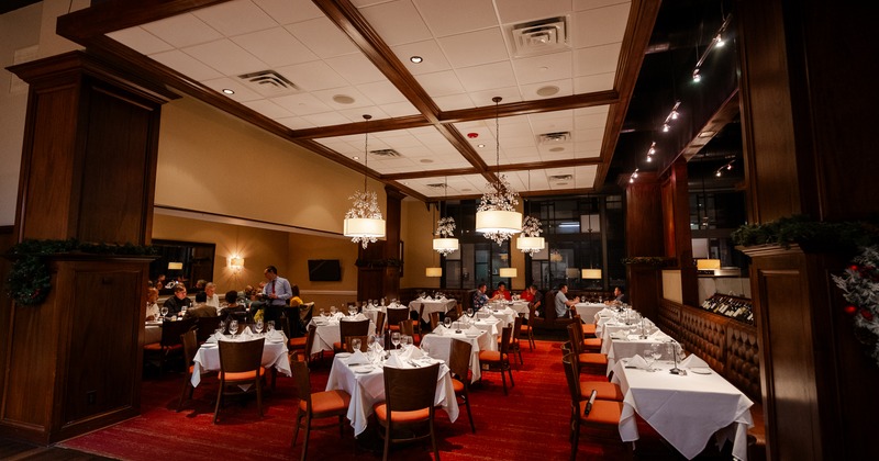 Interior, diner area, tables, chairs, wide view