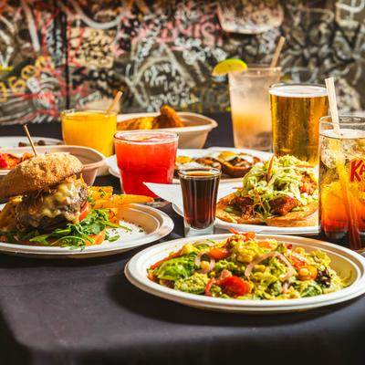 Various food and drinks on the table.