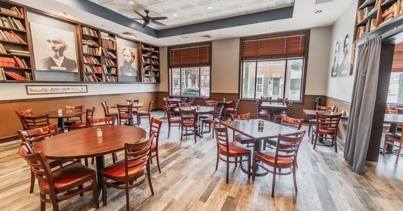 Interior, tables and chairs in seating area