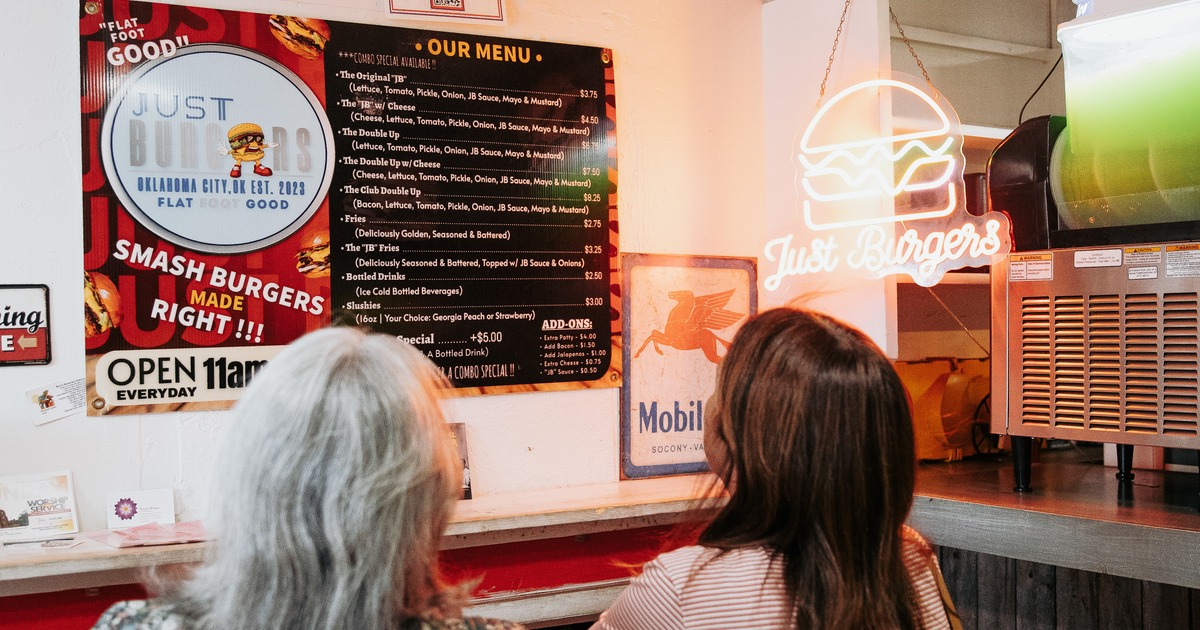 Customers browsing the menu
