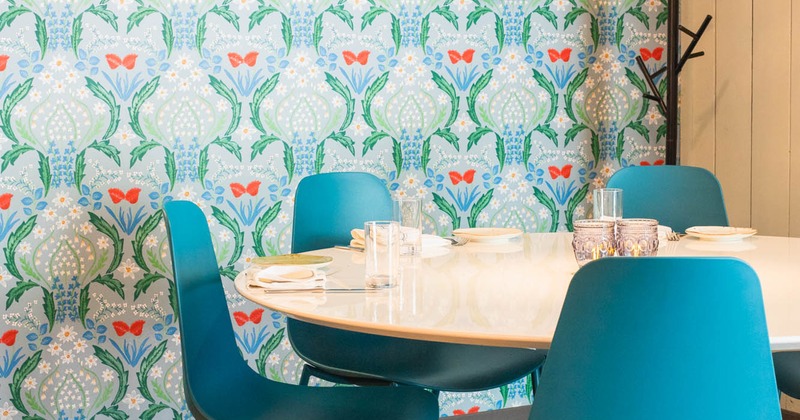 Dining table, colorful wallpaper