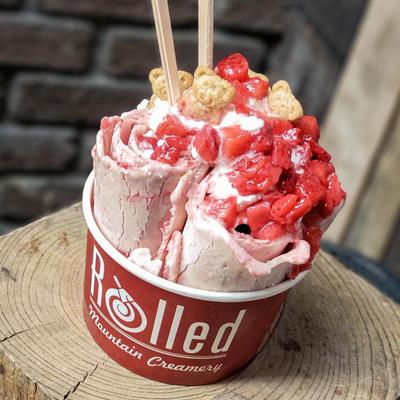 A cup of strawberry rolled ice cream from Rolled Mountain Creamery.