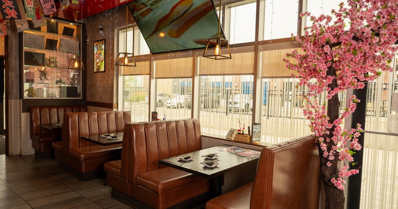 Interior, booths with tables by the windows