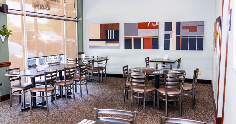 Interior, tables and chairs ready for guests