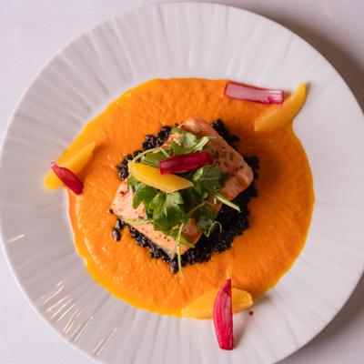 Grilled wild king salmon filet with wild rice and carrot puree.