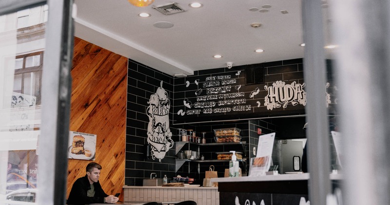 Interior, diner area, tables and chairs, guest, counter behind