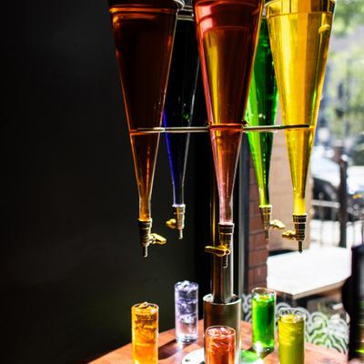 Funky metal and glass syrup dispenser for traditional Georgian soft drinks
