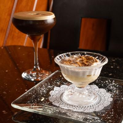 Creamy dessert with meringue and espresso martini.