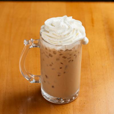 vanilla iced coffee topped with whip cream..