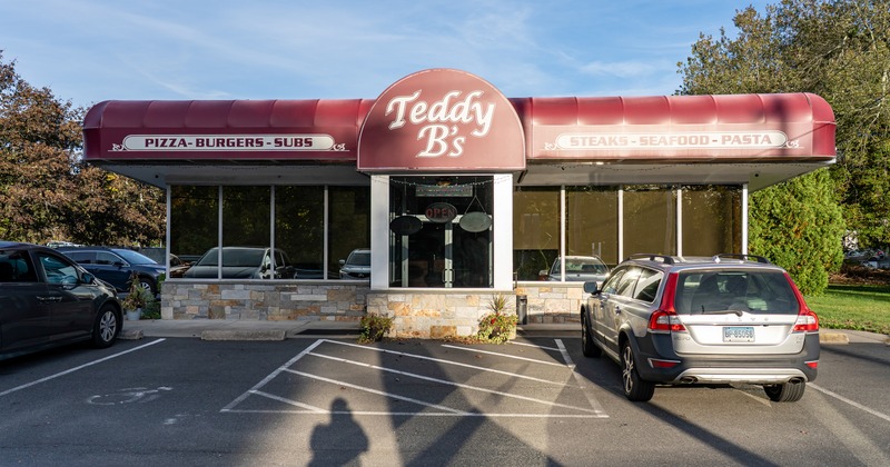 Exterior, front view to restaurant, entrance, sign above