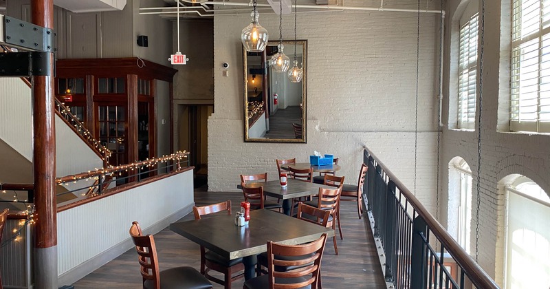 Interior, tables and chairs on the upper floor