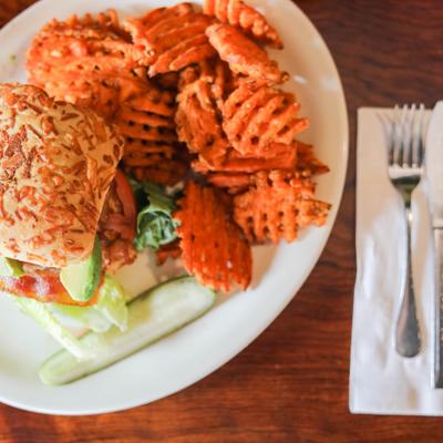 Sandwich served with waffle fries.