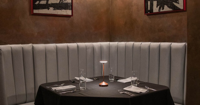 Interior, table in the corner set for guests