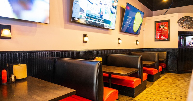 Interior, booths, TVs on the wall