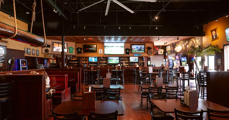 Spacious sports bar with a rustic interior dining area