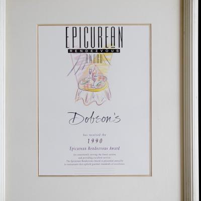 A framed 'Epicurean Rendezvous Award' received in 1990