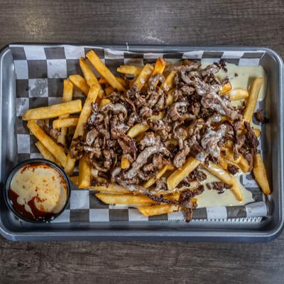Loaded fires with steak and cheese.