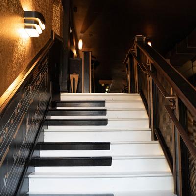 stairs leading up to top floor bar.