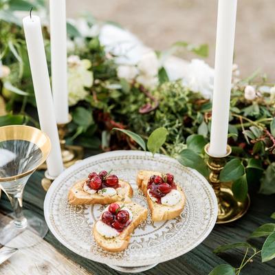 Crostini served on a table decorated for Christmas