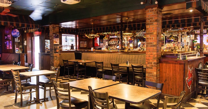 Interior, tables with chairs waiting for the guests