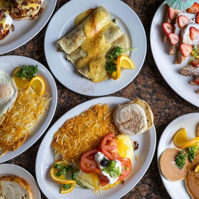 Assortiment of meals served on the table, top view.