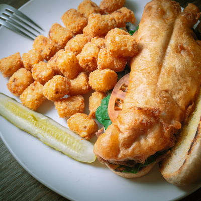 Fried fish sandwich, nuggets and pickles