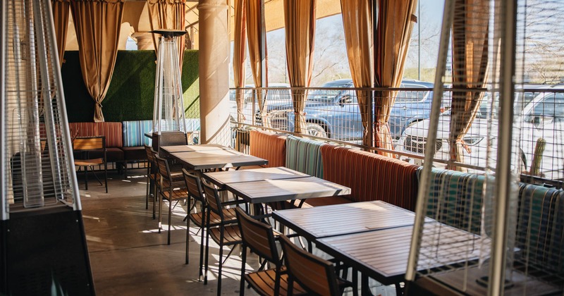 Covered patio area, tables and chairs