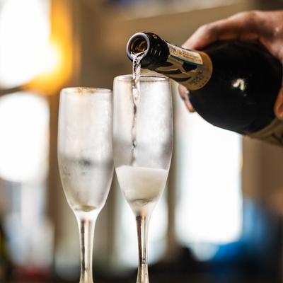 Wine pouring in the glass.