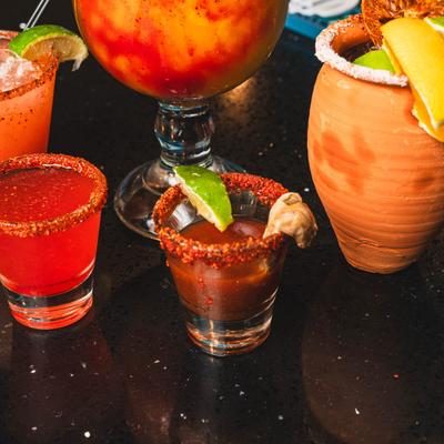 Assorted shots and cocktails.