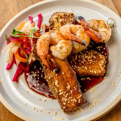 Surf & Turf, Kurobuta pork, marinated prawns, toasted sesame seeds, sweet soy glaze, pickled daichon.
