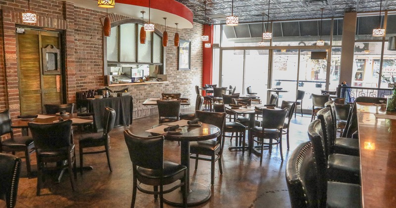 Cozy interior dining area with set tables