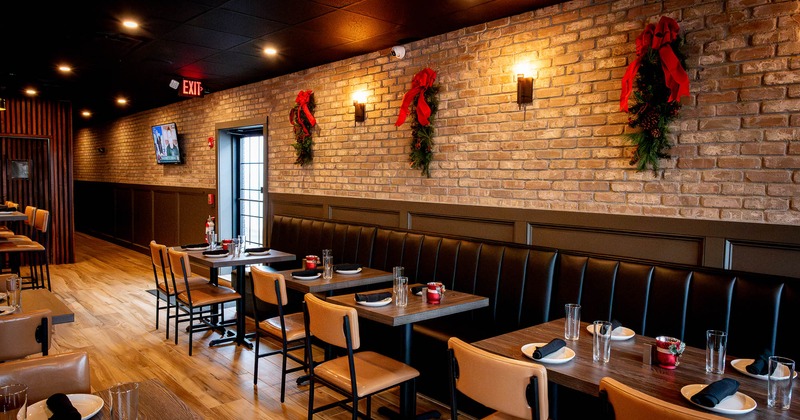 Interior, Banquette Seating with tables with tableware all lined up