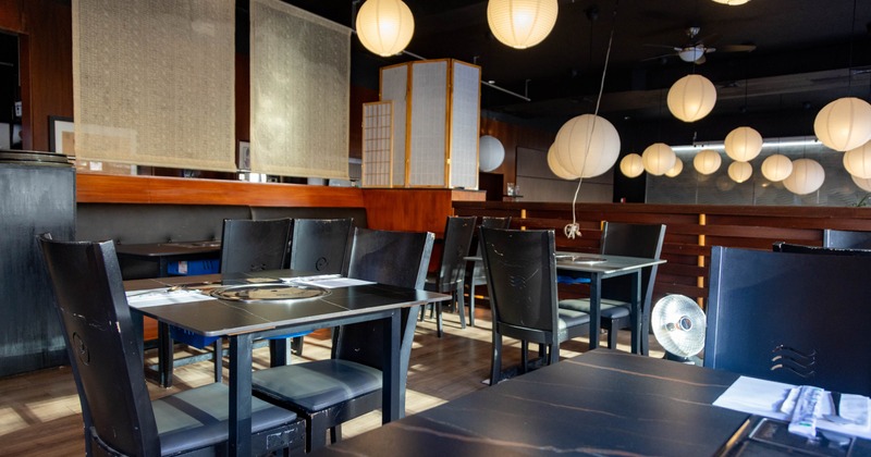 Interior seating area with hanging lanterns