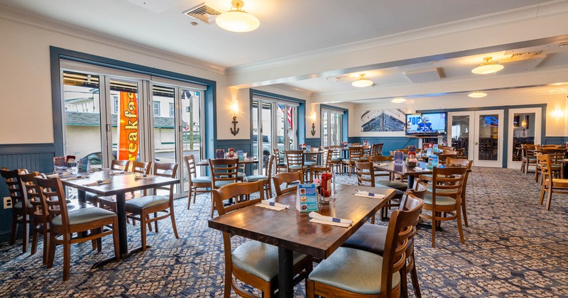 Interior, seating area, tables ready for guests