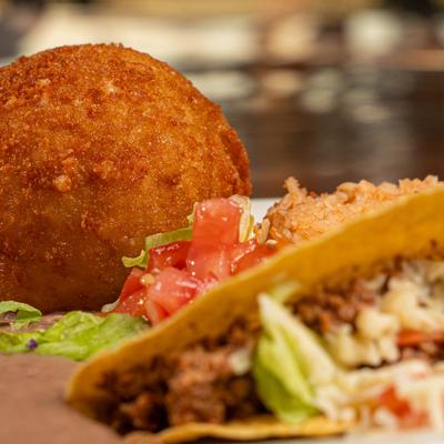 Stuffed avocado and taco.