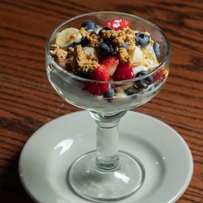 A glass of yogurt parfait.