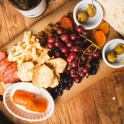 Hot blooded signature charcuterie board, overhead view.