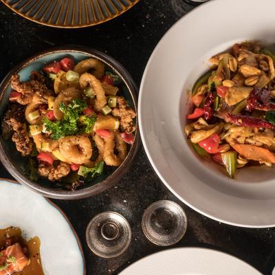 Various dishes served on the table.