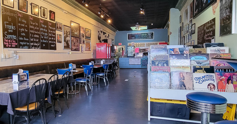 Interior dining area, vinyl record shelf on the right