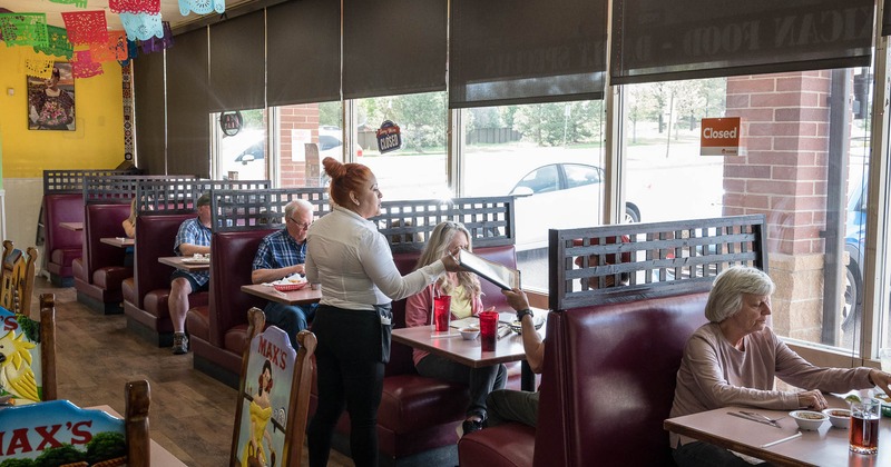 Interior, booths full of guests