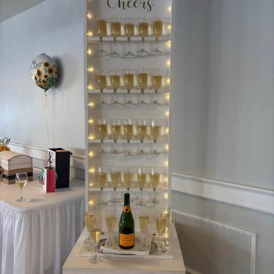 Sparkling wine glasses on the shelf.