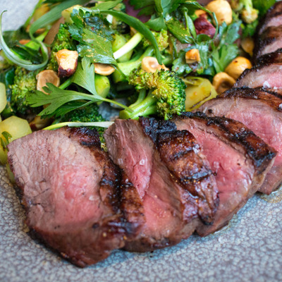 USDA Prime Creekstone Striploin with broccoli, red onion