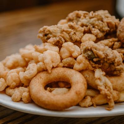Captain's Platter with variety of fried seafood, onion rings and fries.
