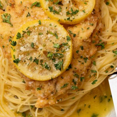 Egg battered chicken, with lemon wine sauce, and capellini pasta.