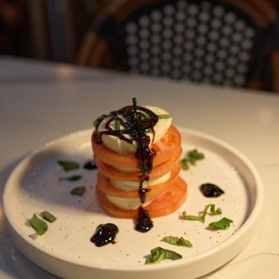 Caprese style stack with balsamic glaze.
